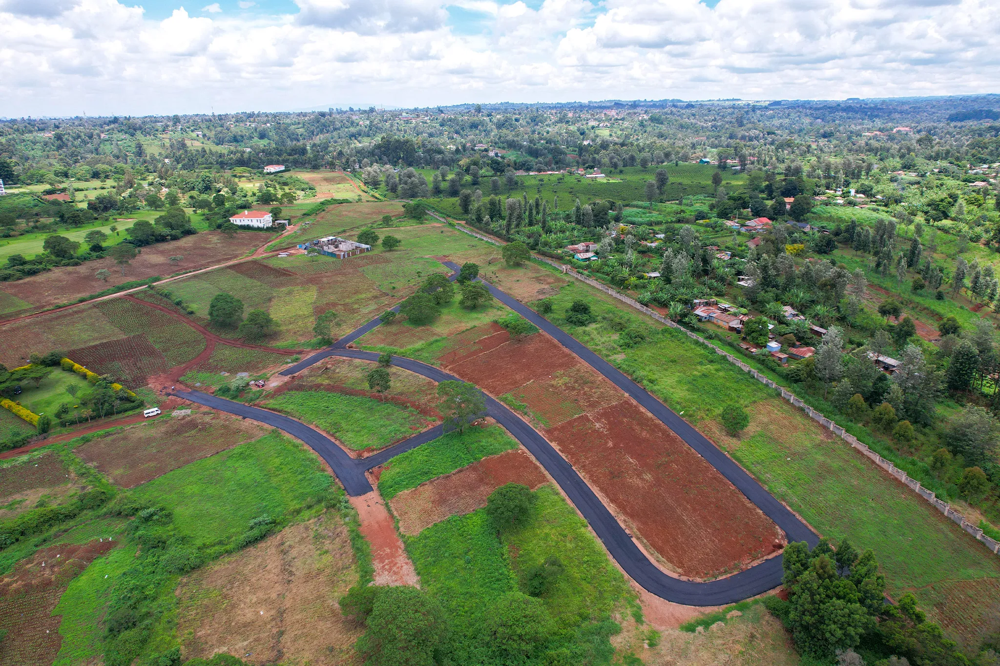 Mukinduri plots after tarmac — newly laid roads and plot boundaries, Migaa Golf Estate